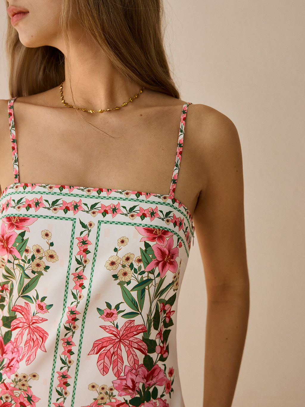 Mini-robe à fines bretelles imprimé floral