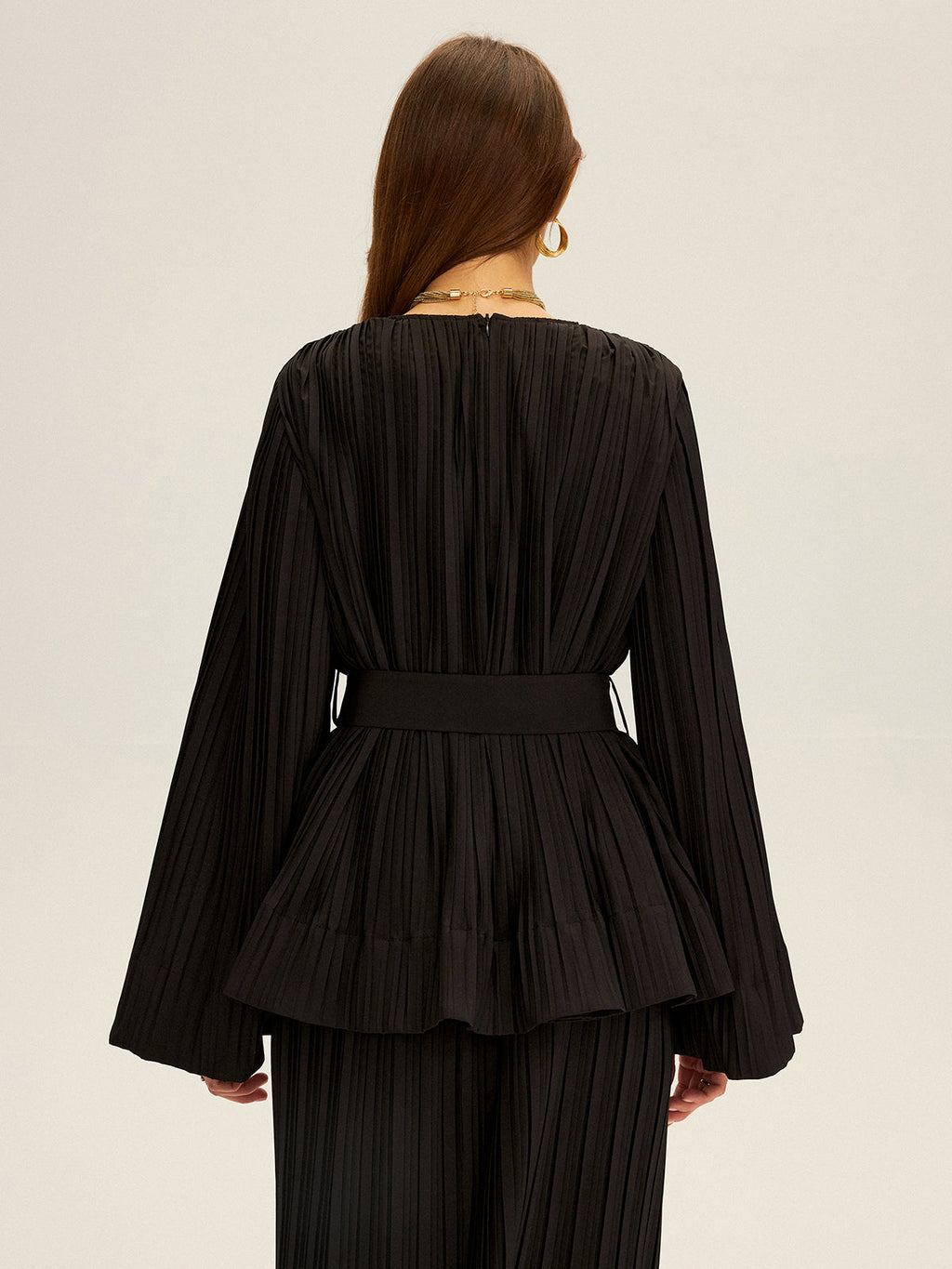 Plissierte Bluse mit Glockenärmeln und Schößchen-Gürtel