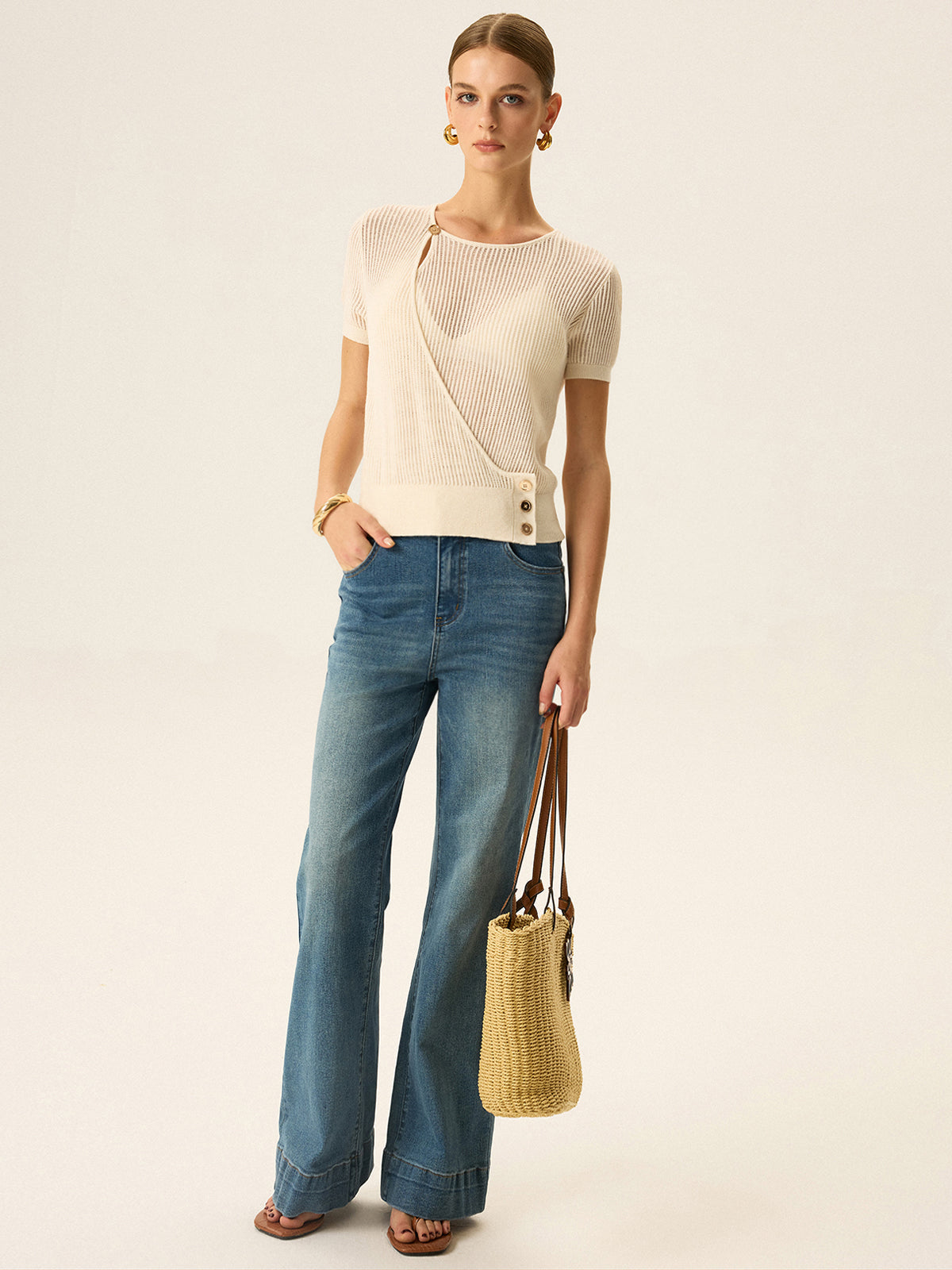 Haut asymétrique en maille boutonnée 