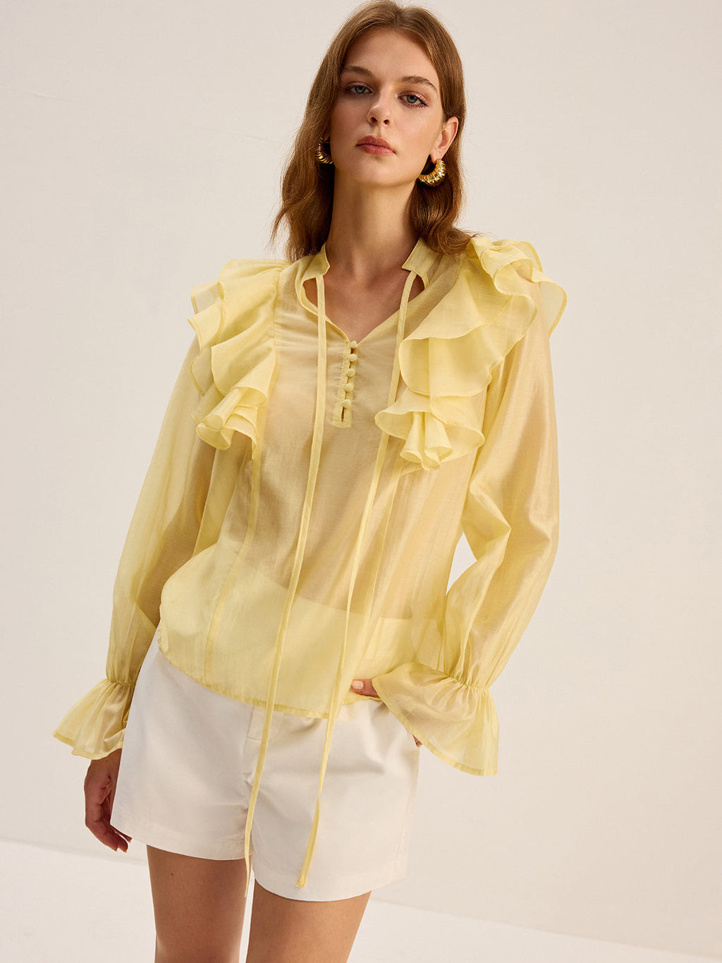 Chemisier semi-transparent en Tencel à col lavallière et volants