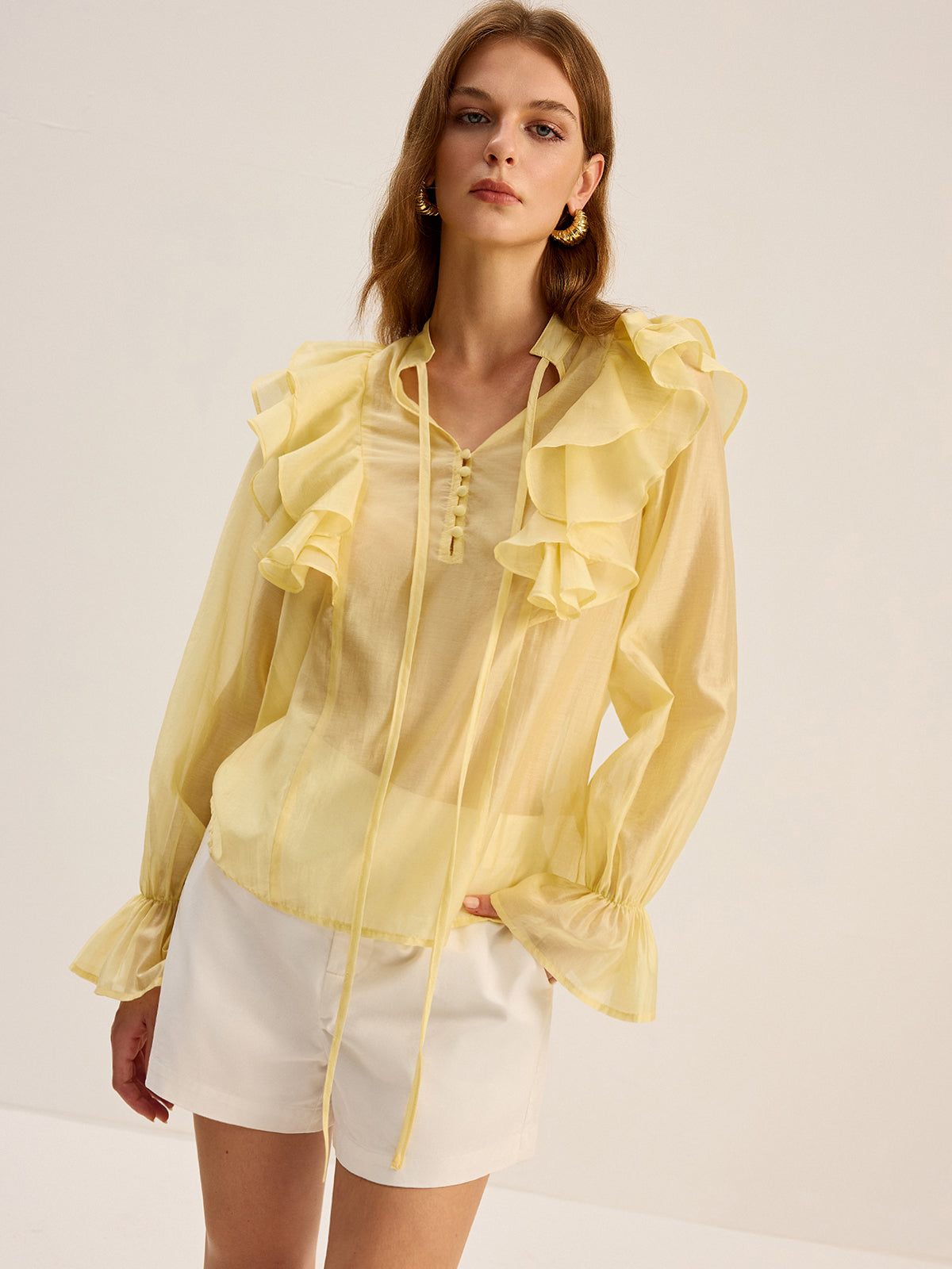 Chemisier semi-transparent en Tencel à col lavallière et volants