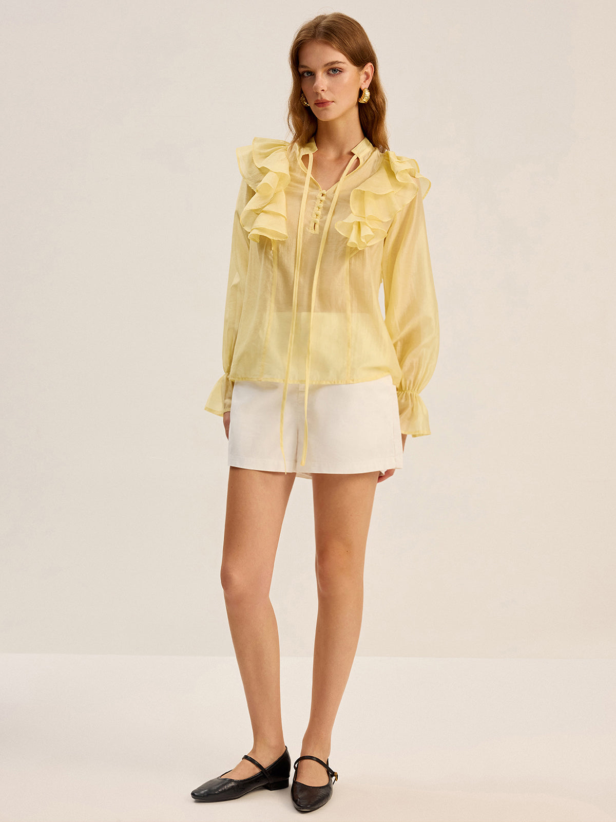 Chemisier semi-transparent en Tencel à col lavallière et volants