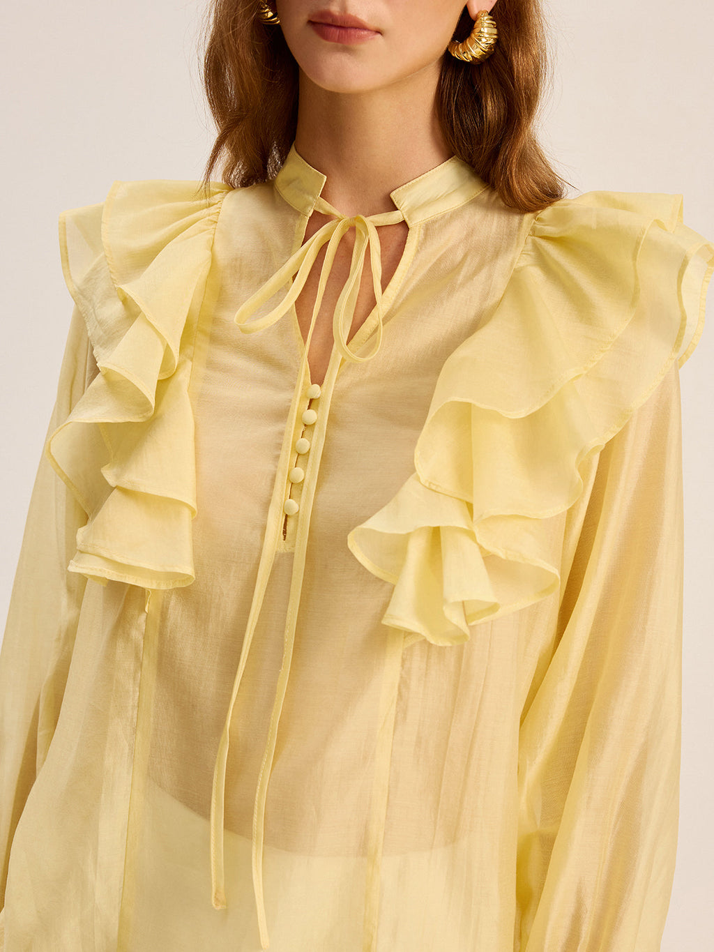 Chemisier semi-transparent en Tencel à col lavallière et volants