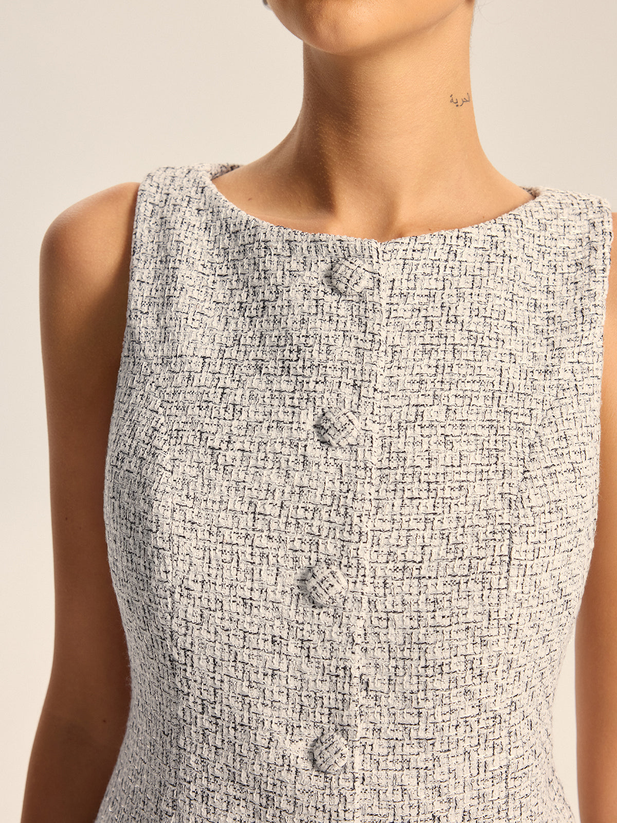 Gilet boutonné en tweed texturé