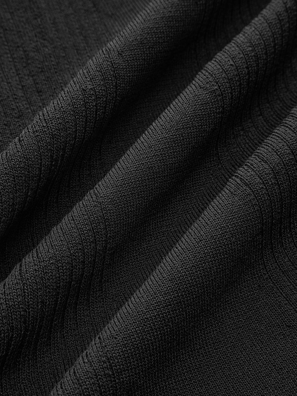 Jupe midi en maille côtelée avec ceinture à nœud contrastante