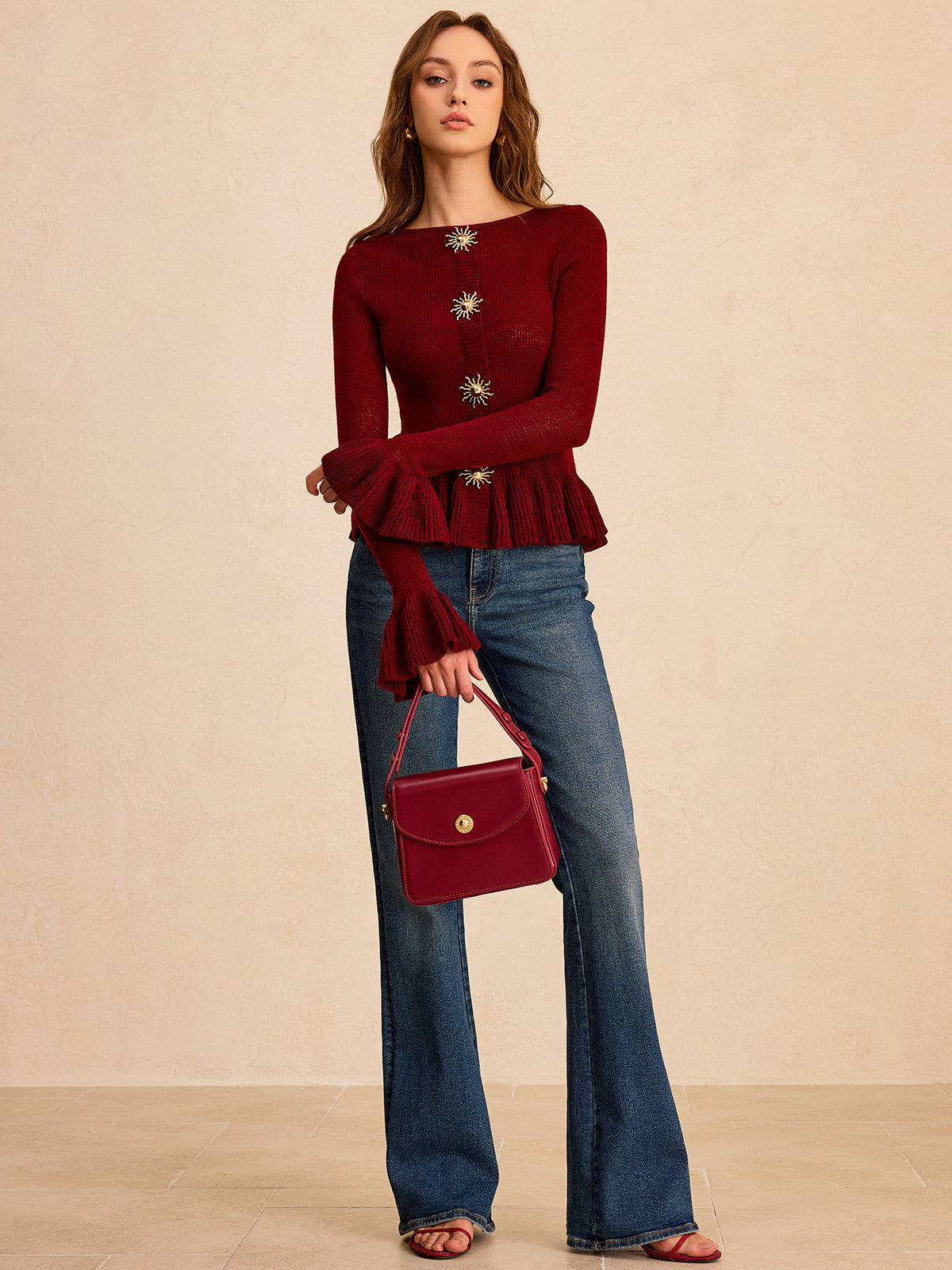 Metal Detail Ruffled Hem Knit Top