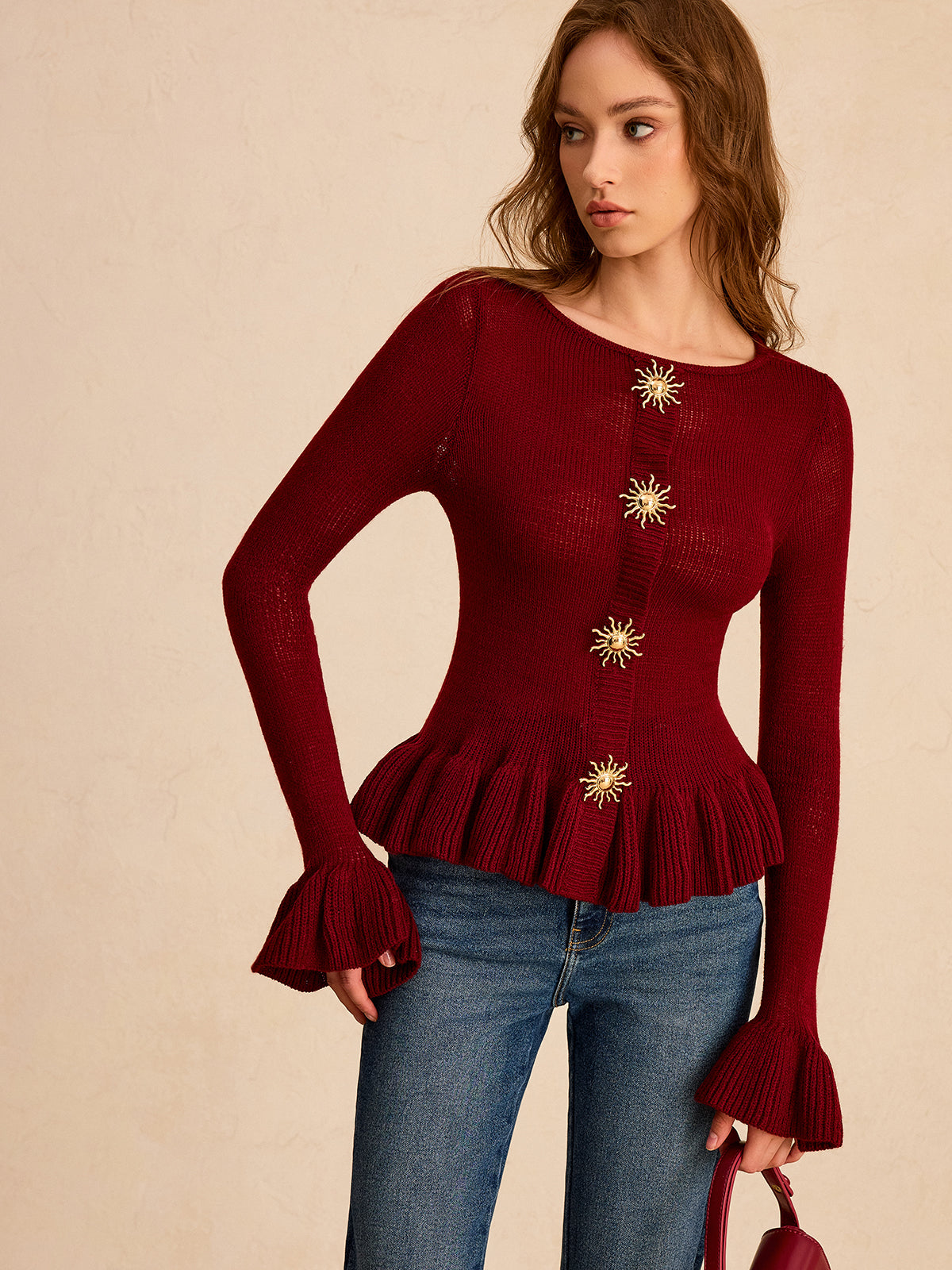 Metal Detail Ruffled Hem Knit Top