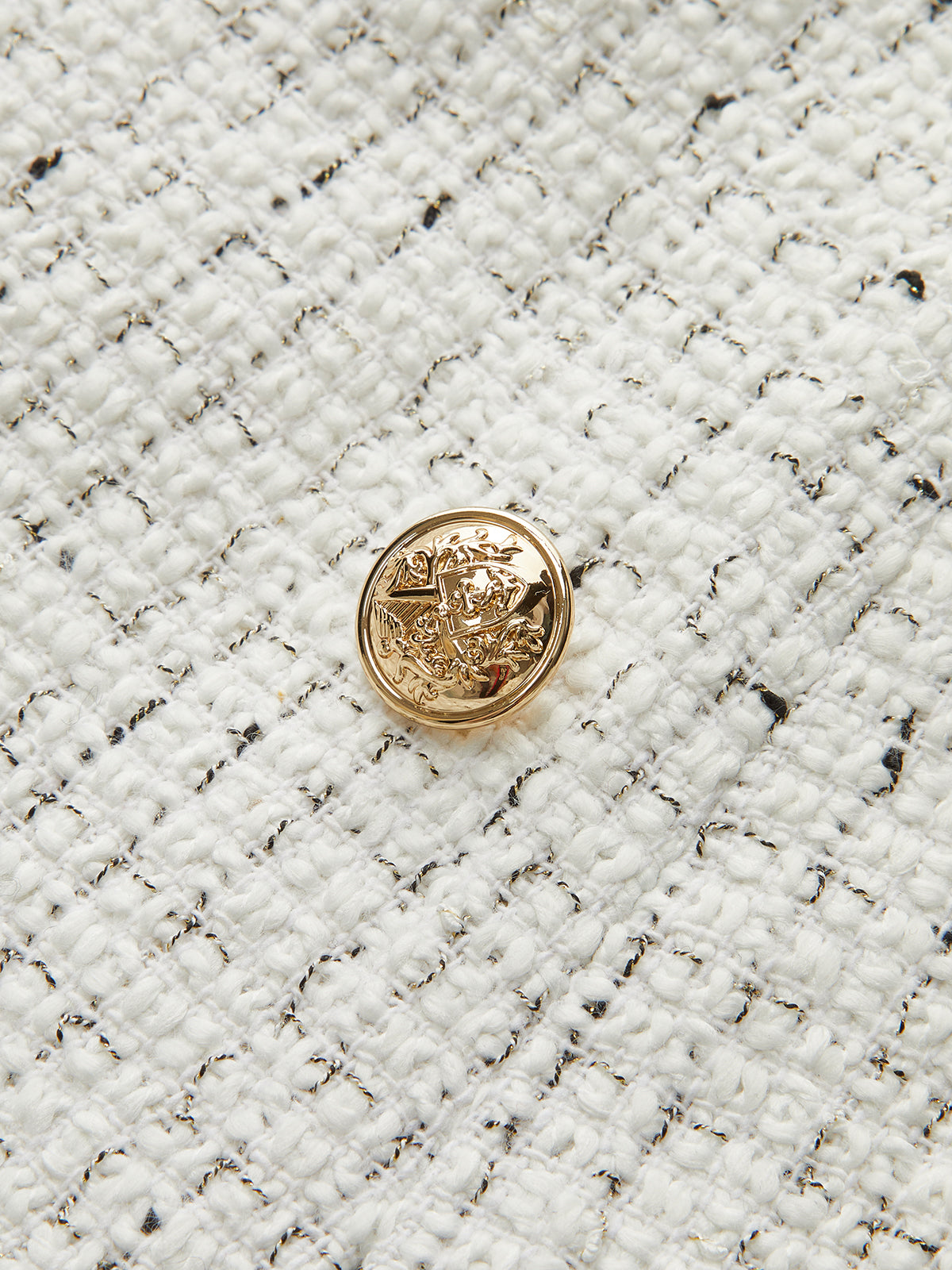 Minirock aus Tweed mit Metallknöpfen und Falten 