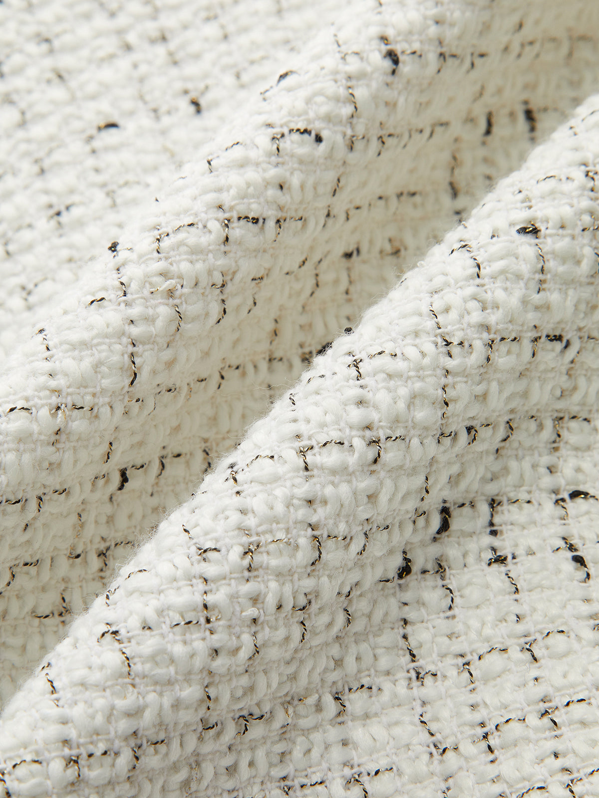 Minirock aus Tweed mit Metallknöpfen und Falten 