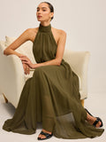 Robe longue en mousseline semi-transparente à licou et nœud au dos