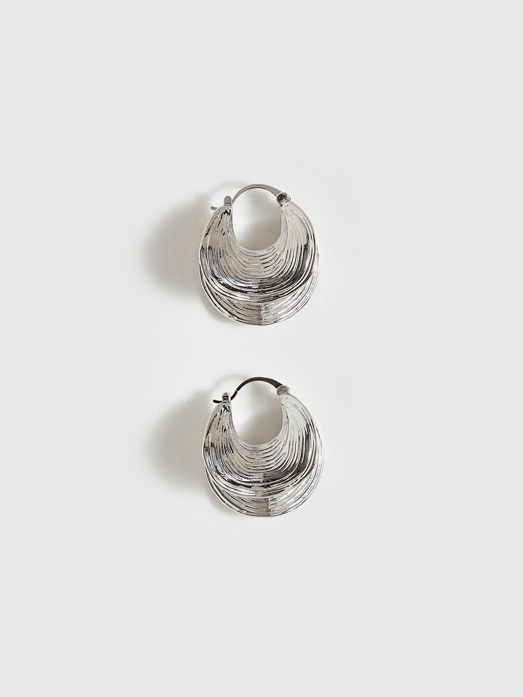 Boucles d'oreilles créoles texturées