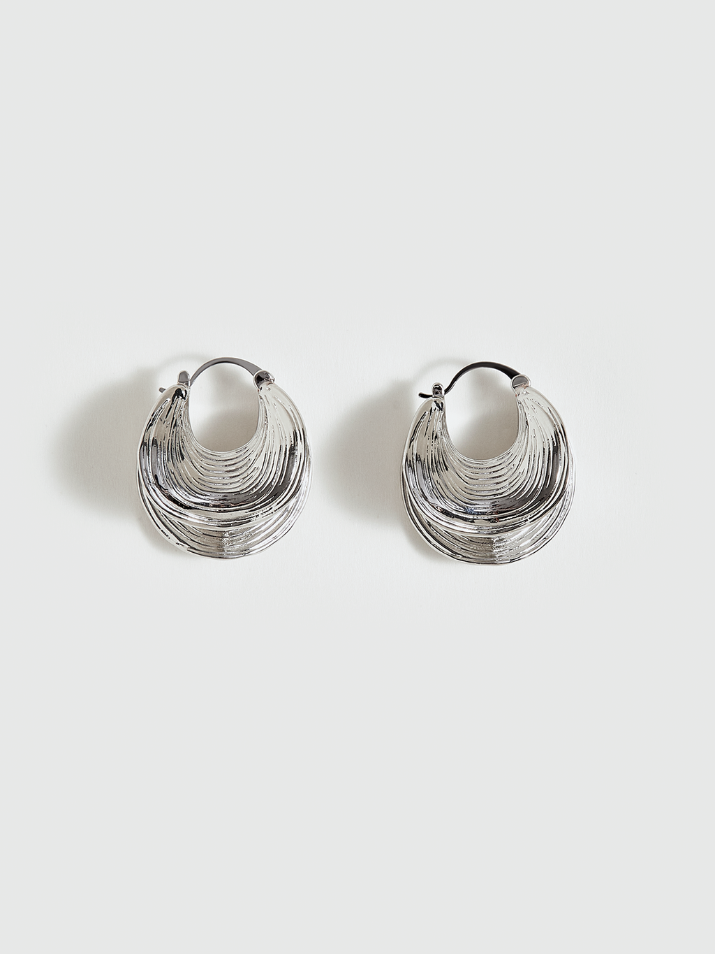 Boucles d'oreilles créoles texturées