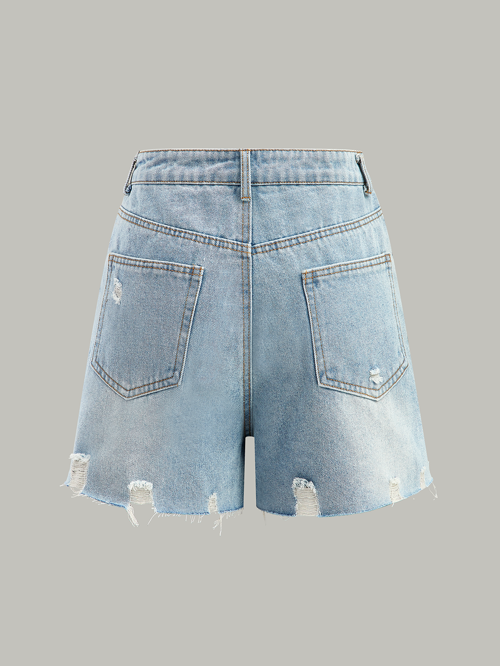 Short en jean asymétrique et déchiré à la taille