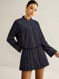 Set aus Jacke mit Reißverschluss und plissiertem Minirock