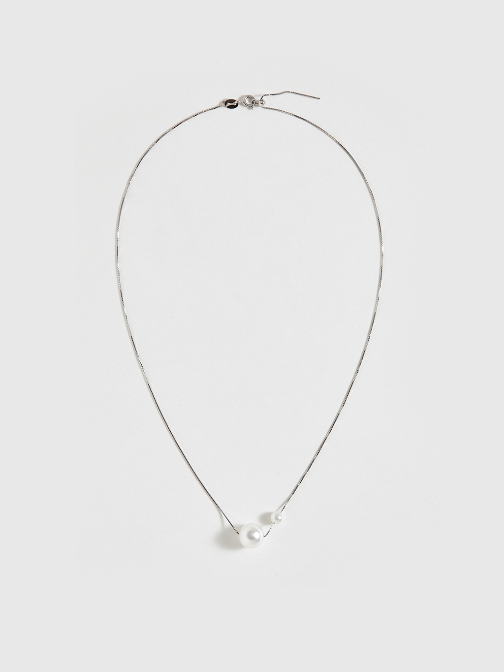 Collier pendentif double perle