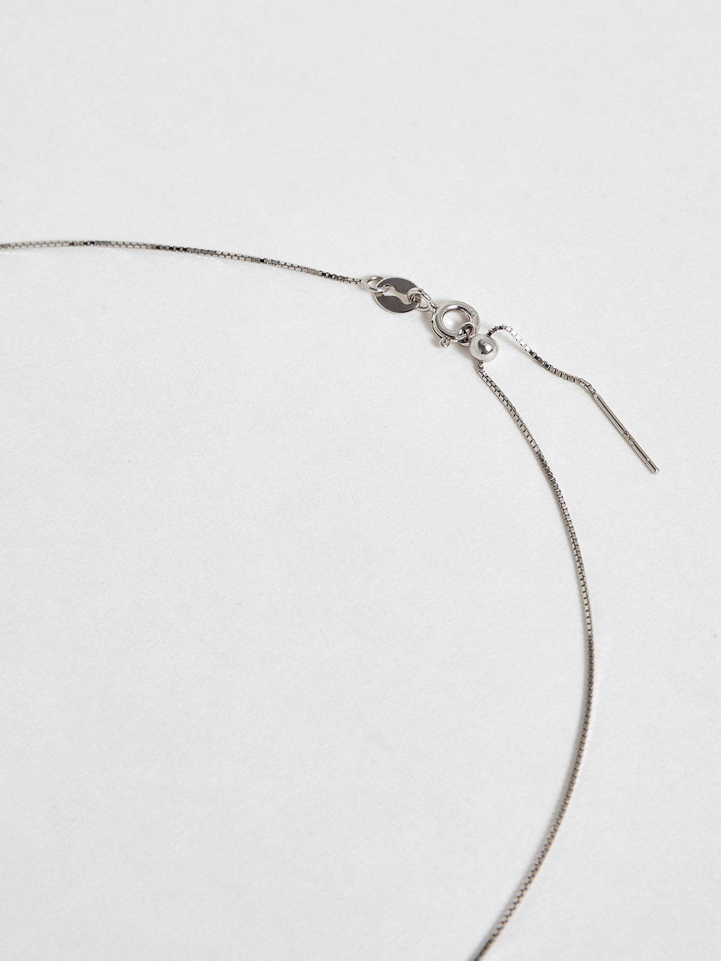 Collier pendentif double perle