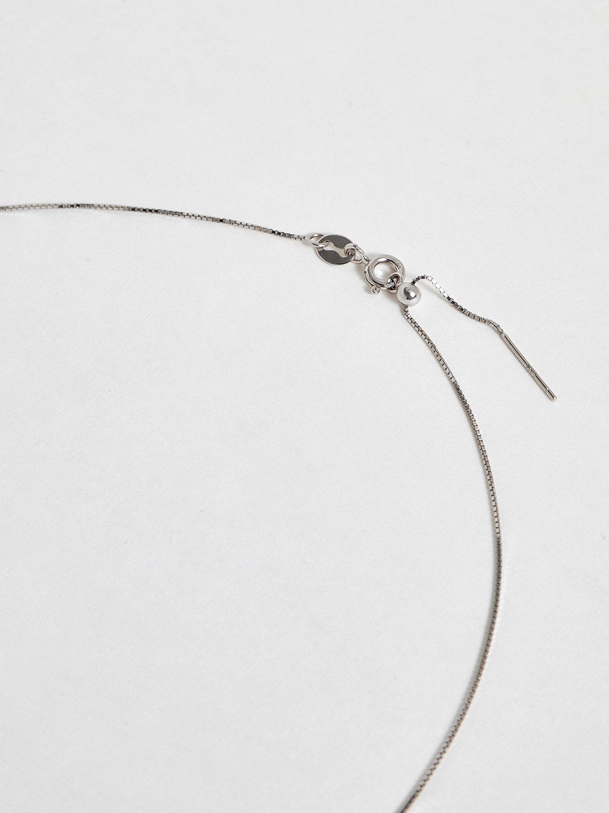 Collier pendentif double perle
