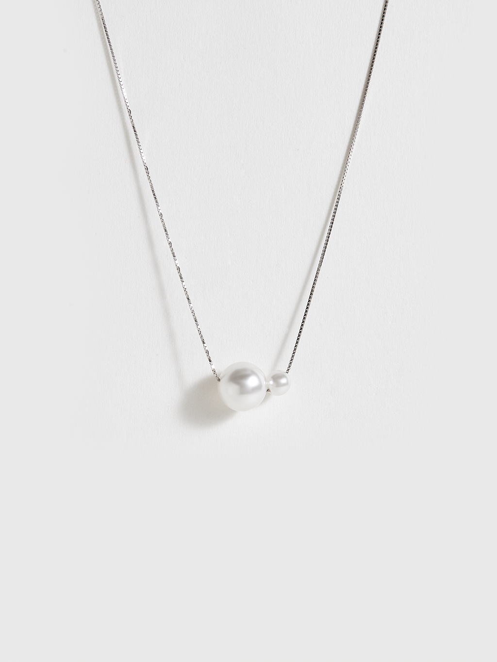 Collier pendentif double perle