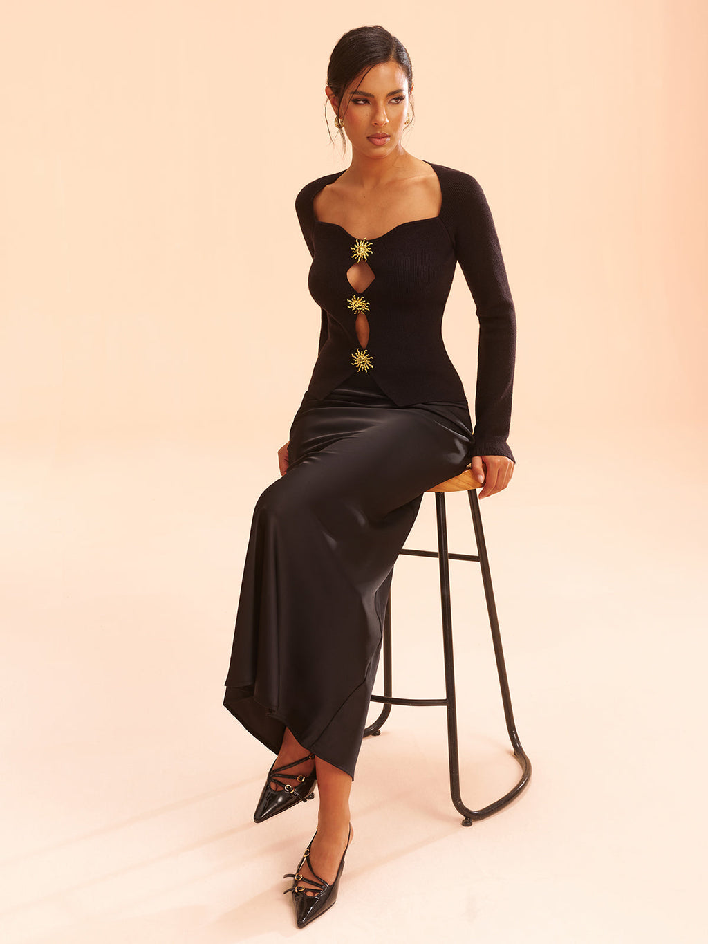 Oberteil aus Strick mit Metalldetails und Cut-Outs