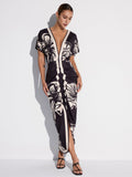 Robe mi-longue froncée à imprimé floral et col en V profond