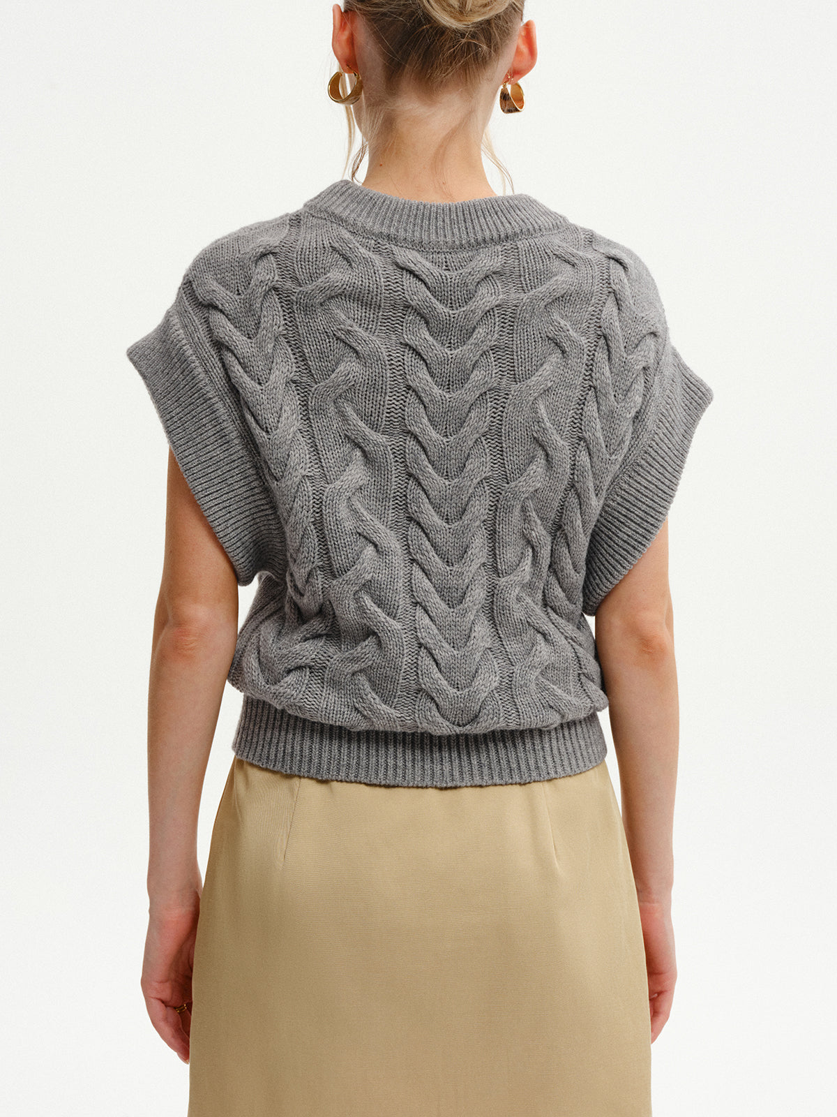 Gilet sans manches en maille torsadée