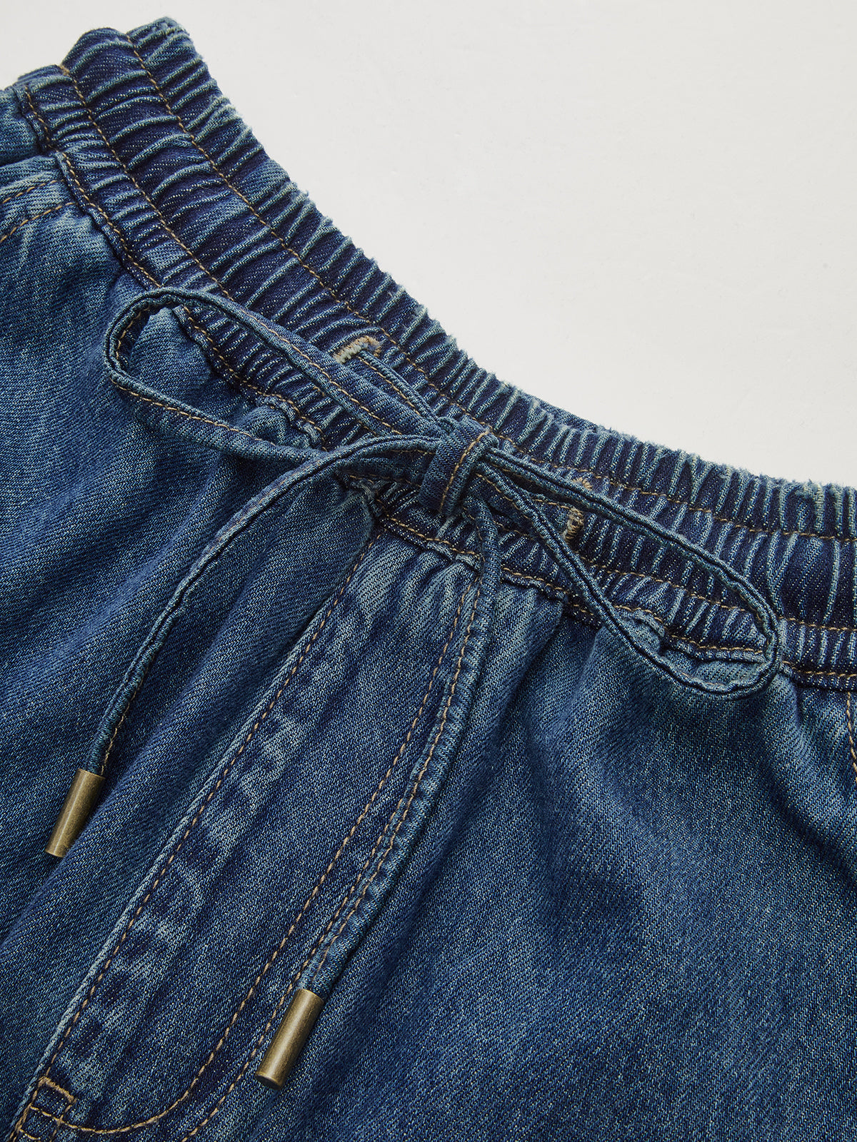 Pantalon en denim à taille élastiquée et jambes larges 