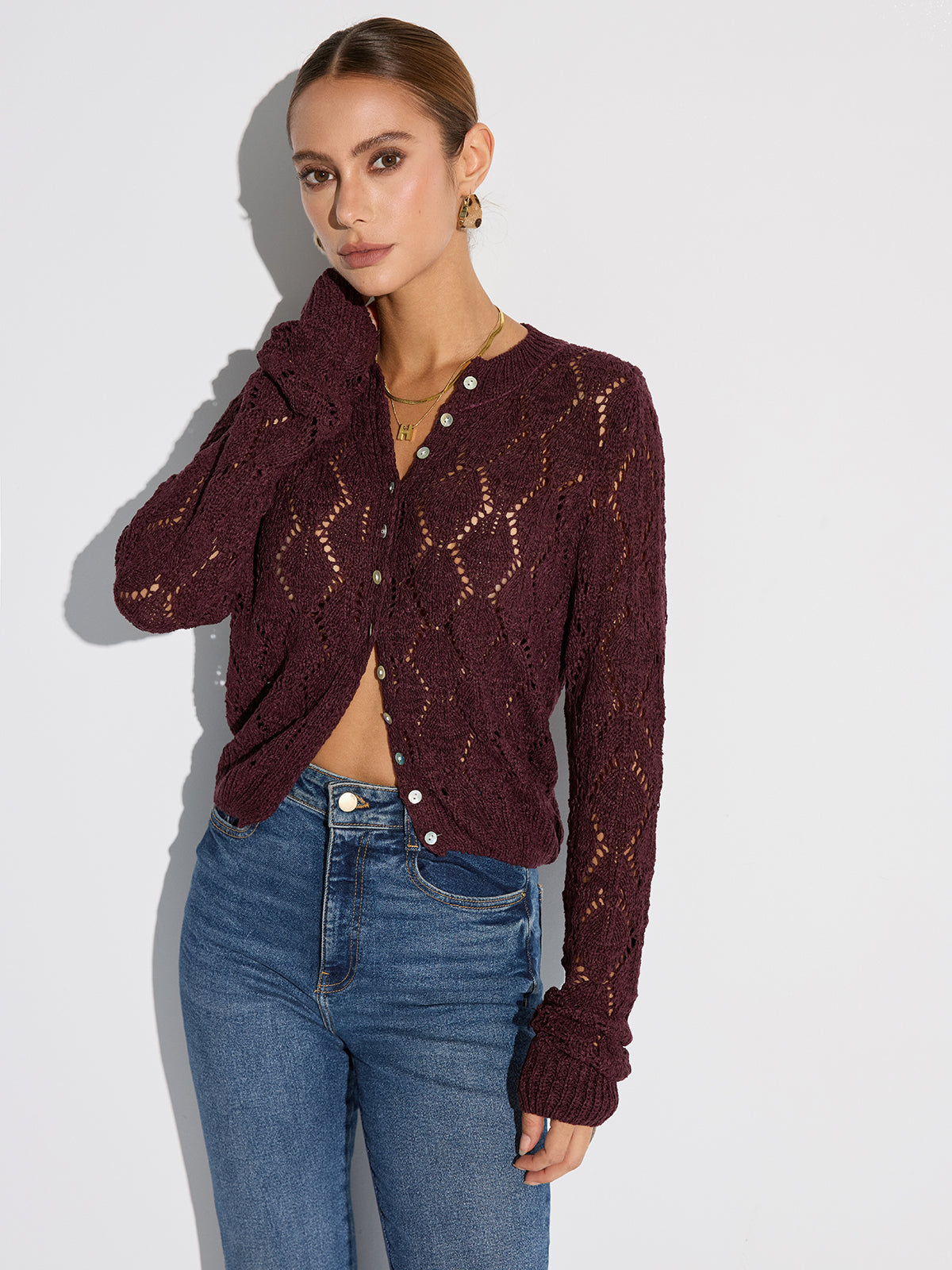 Halbtransparente Lochstrick-Strickjacke