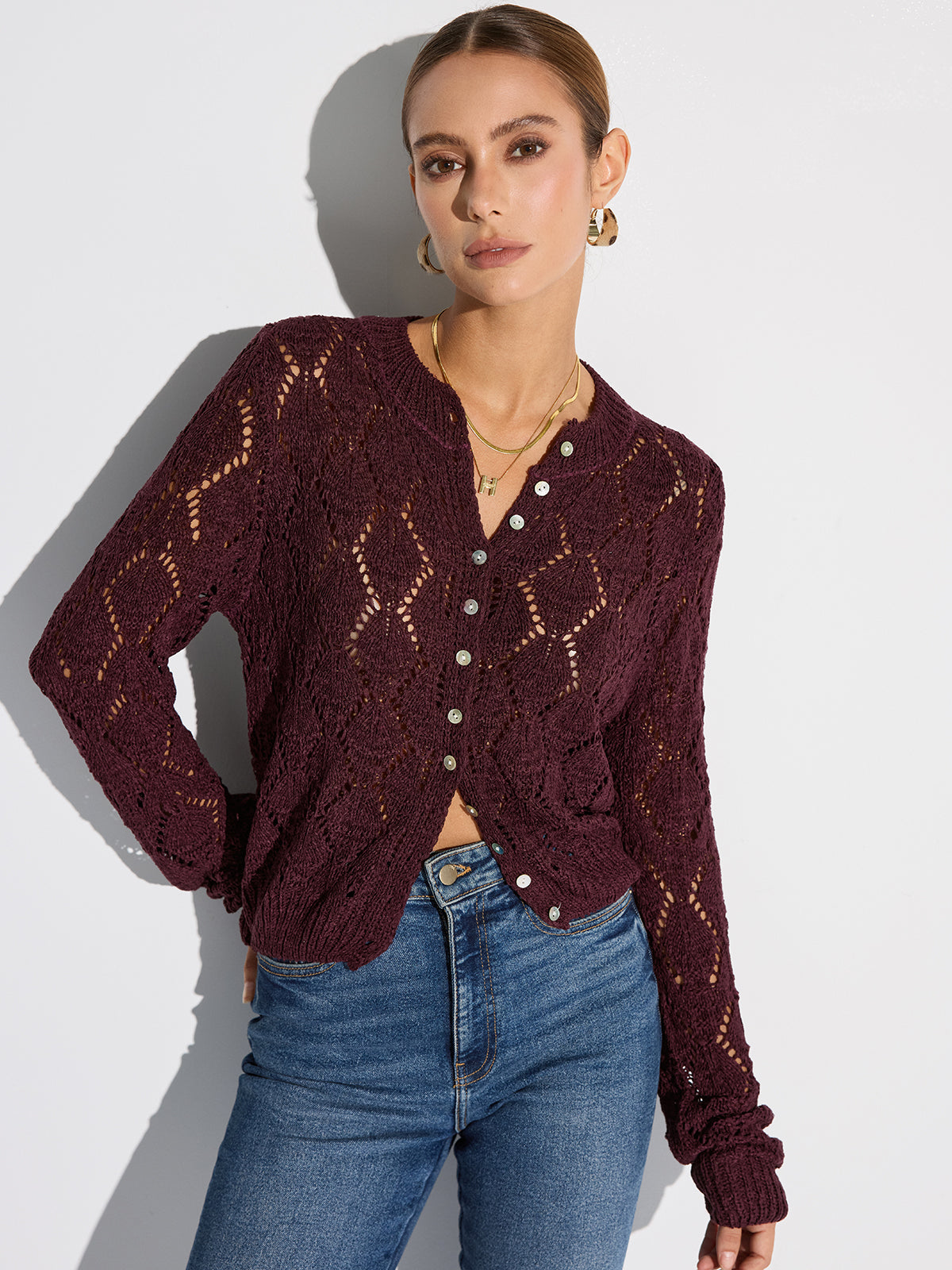 Halbtransparente Lochstrick-Strickjacke