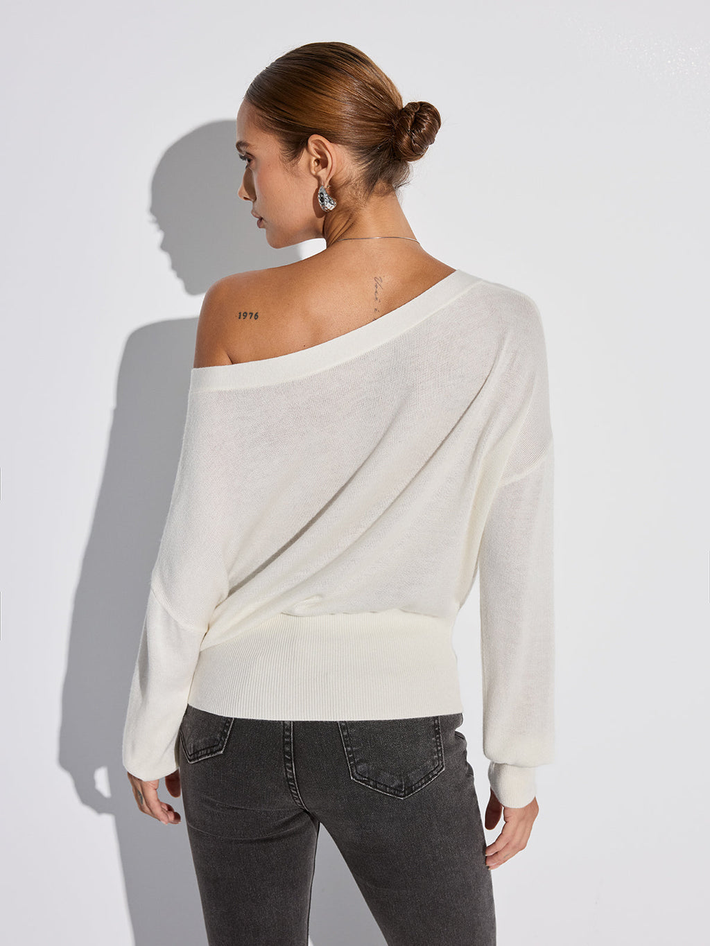 Haut en tricot oversize à épaules dénudées