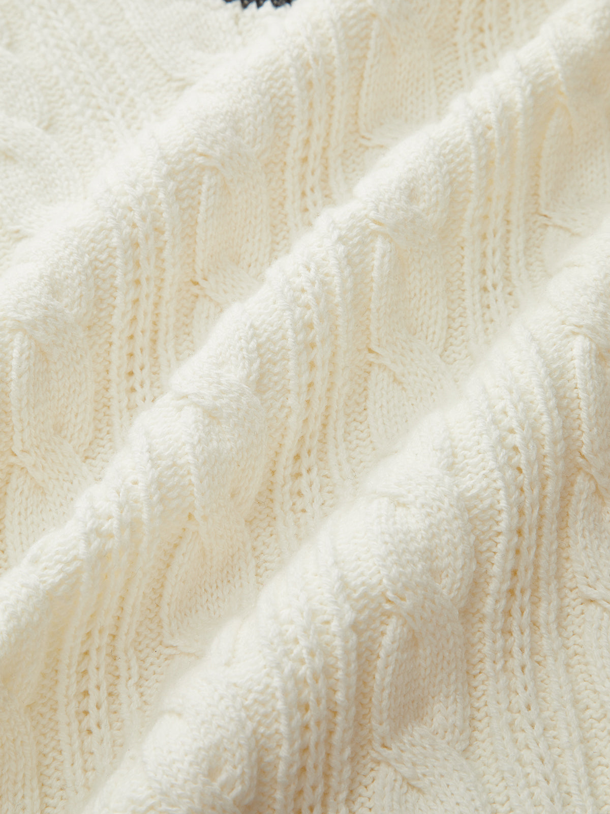 Pull rayé en maille torsadée 