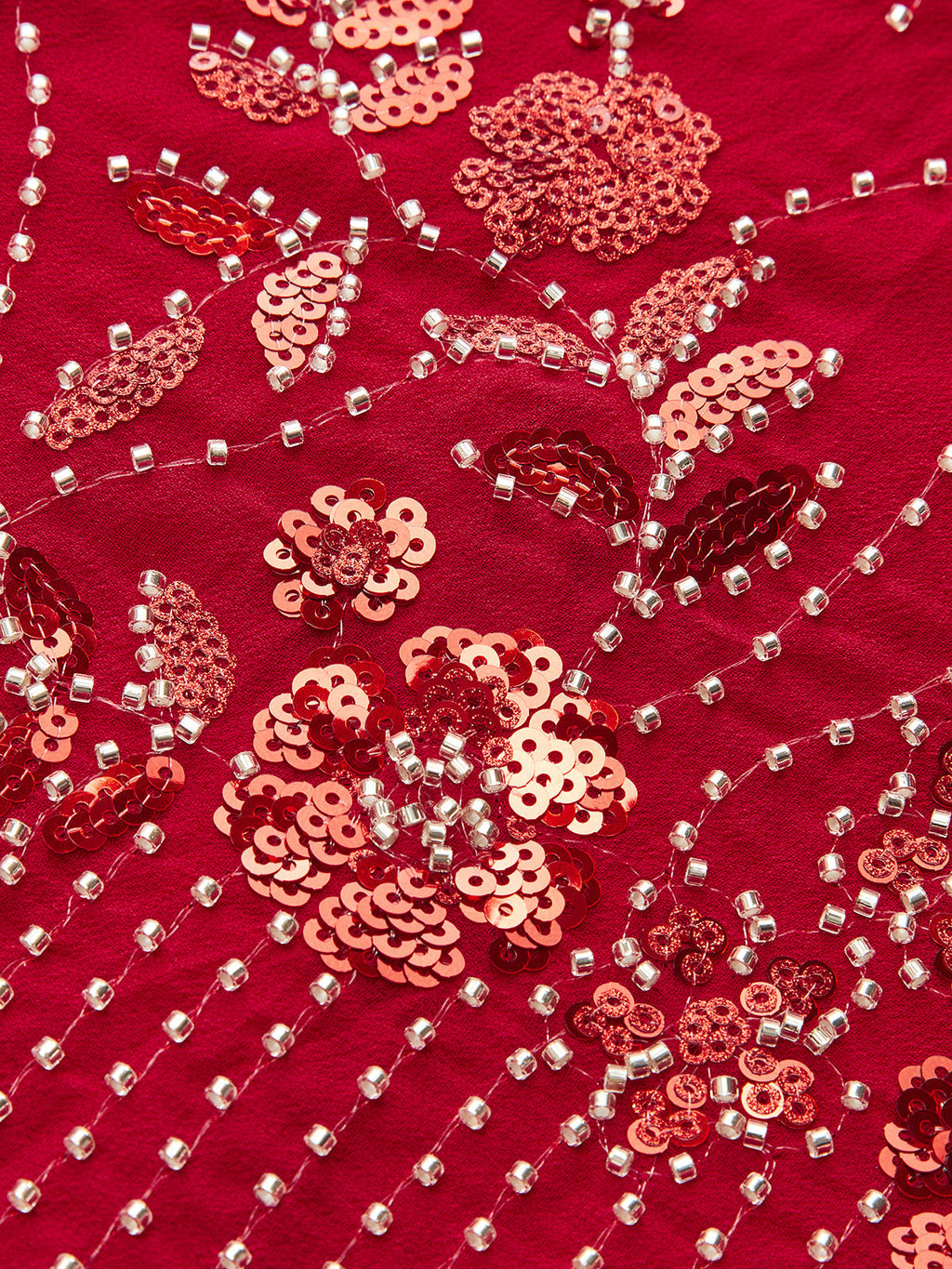 Robe longue dos nu brodée de sequins à col licou