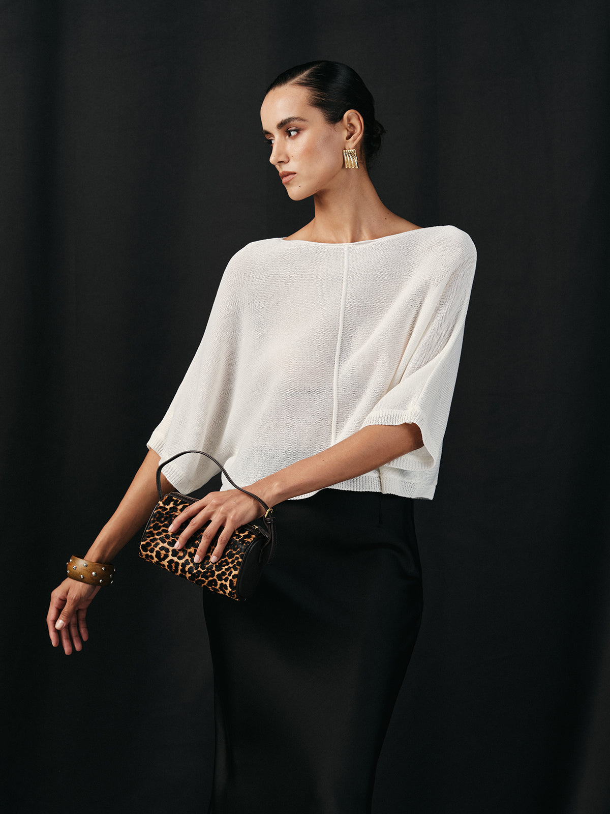 Pull chauve-souris semi-transparent