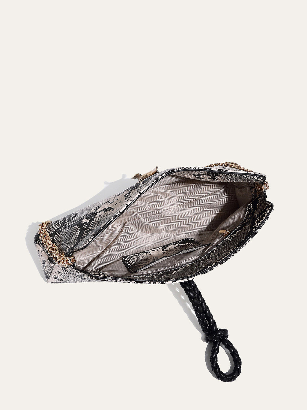 Schultertasche mit Schlangenmuster und Kette