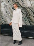 Set aus Oversize-Rollkragenpullover und Maxirock