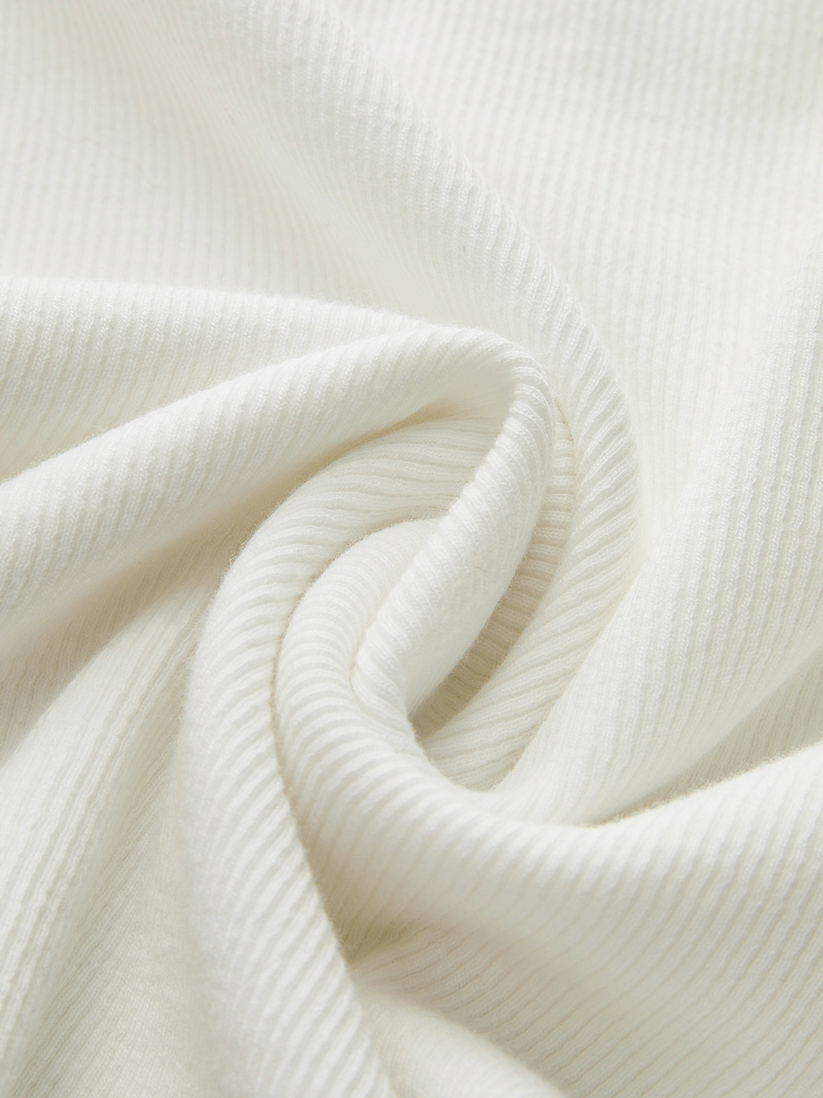 T-shirt à manches longues en coton mélangé côtelé et col en V 