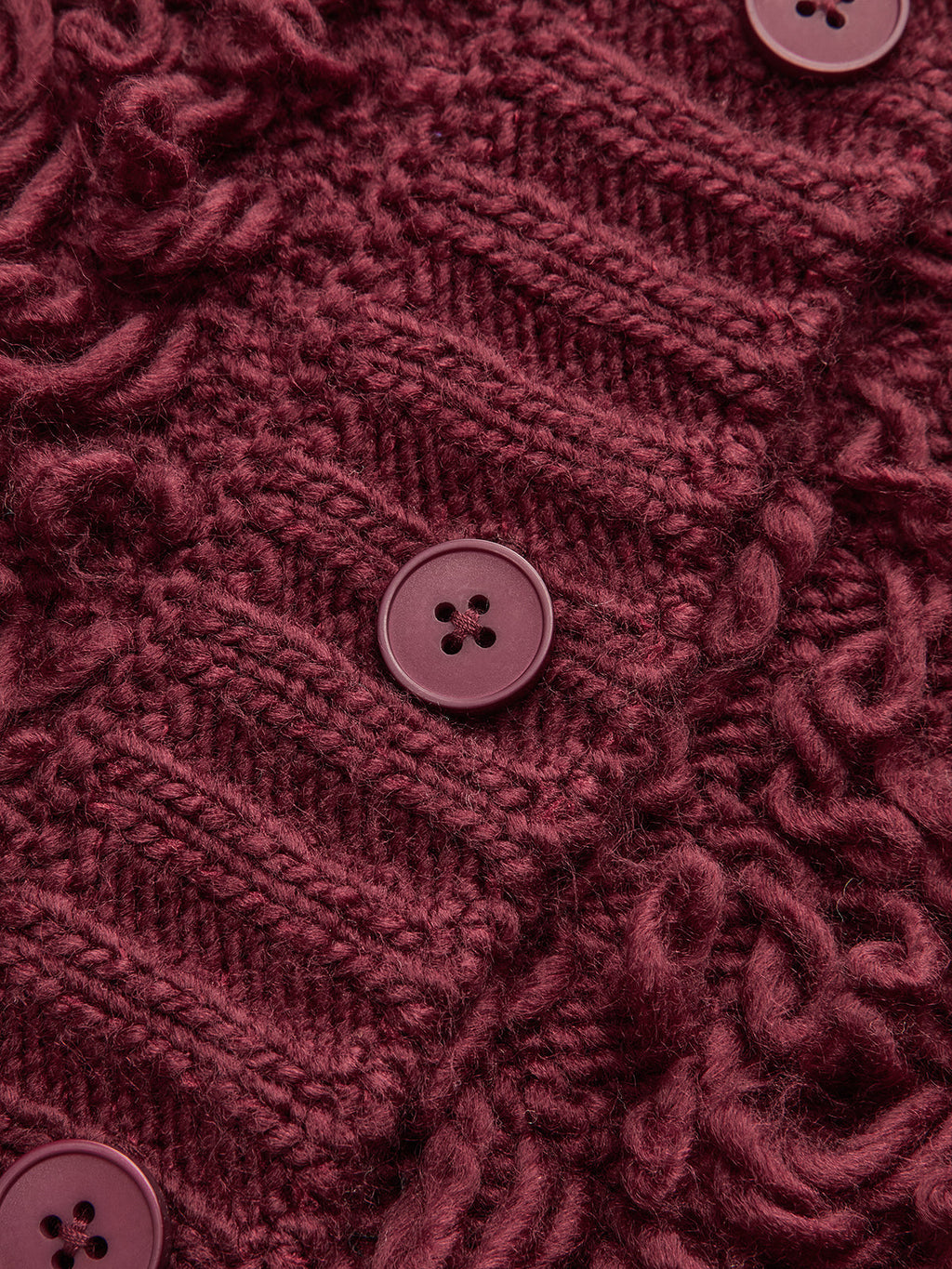 Strukturierter Strickpullover mit Fransen und Knöpfen