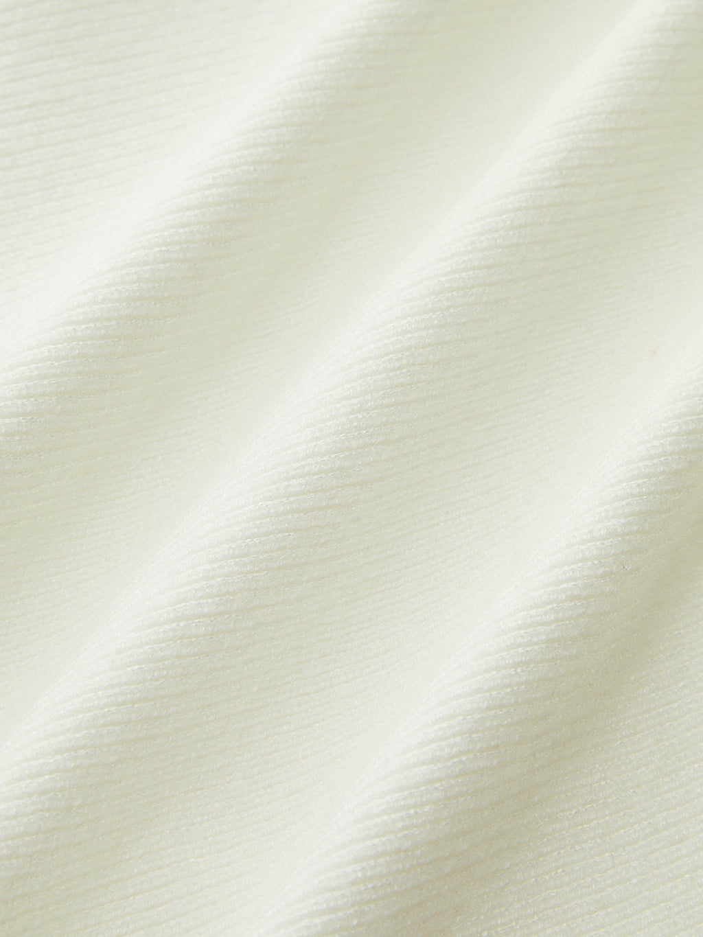 Haut en maille à basque, nœud et ceinture