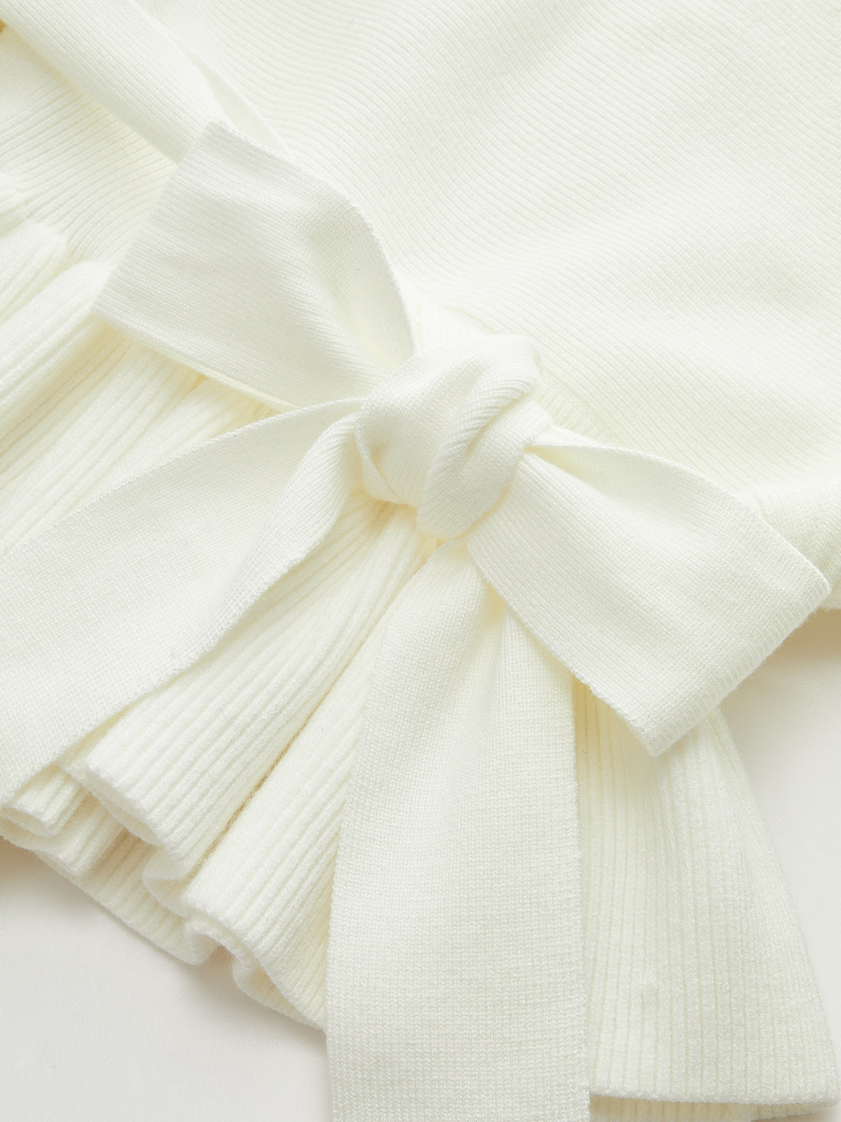 Stricktop mit Schleife und Gürtel, Peplum-Ausschnitt 