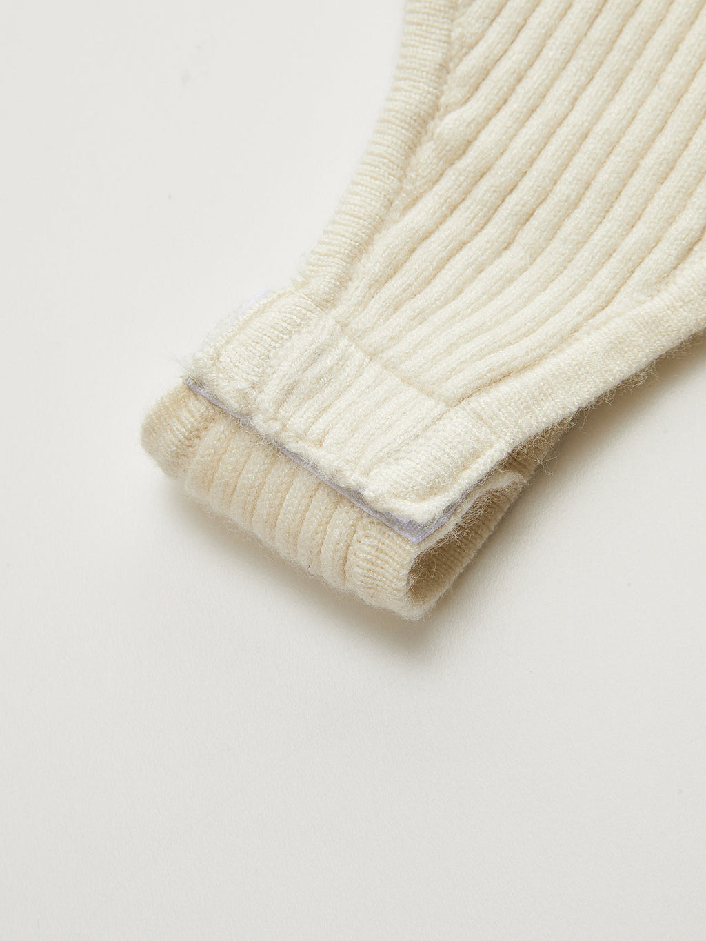 Body en maille côtelée à col polo zippé