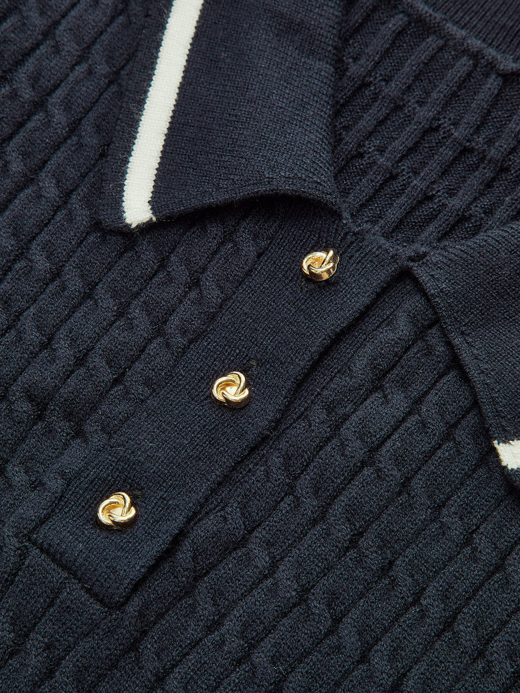 Poloshirt aus Strick mit Kontrastbesatz