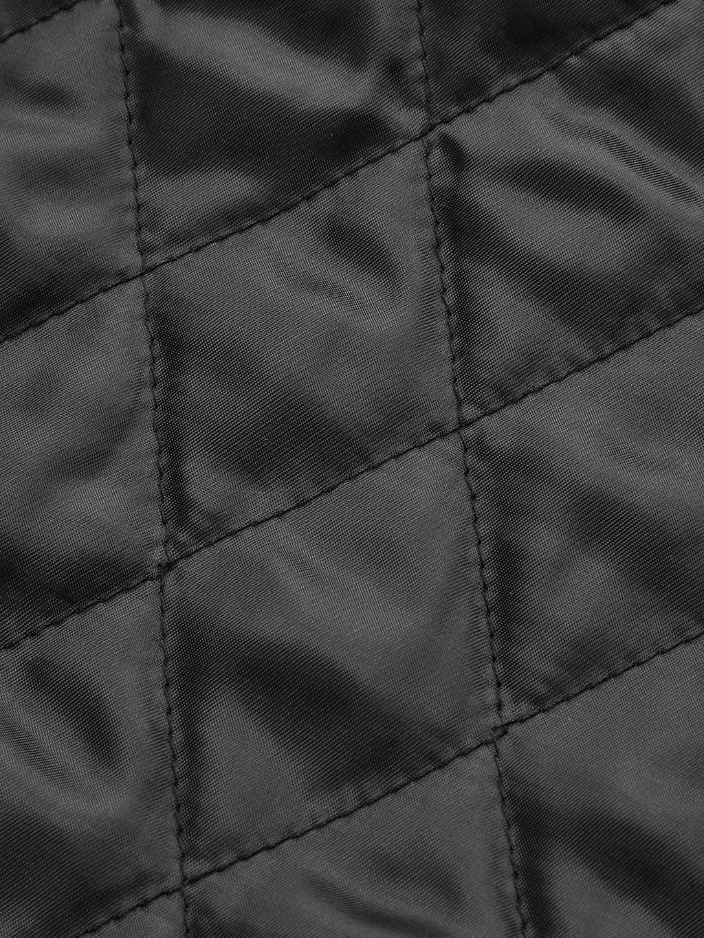 Veste matelassée en similicuir avec col montant et ceinture