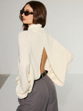 Oversized rückenfreier Rollkragenpullover