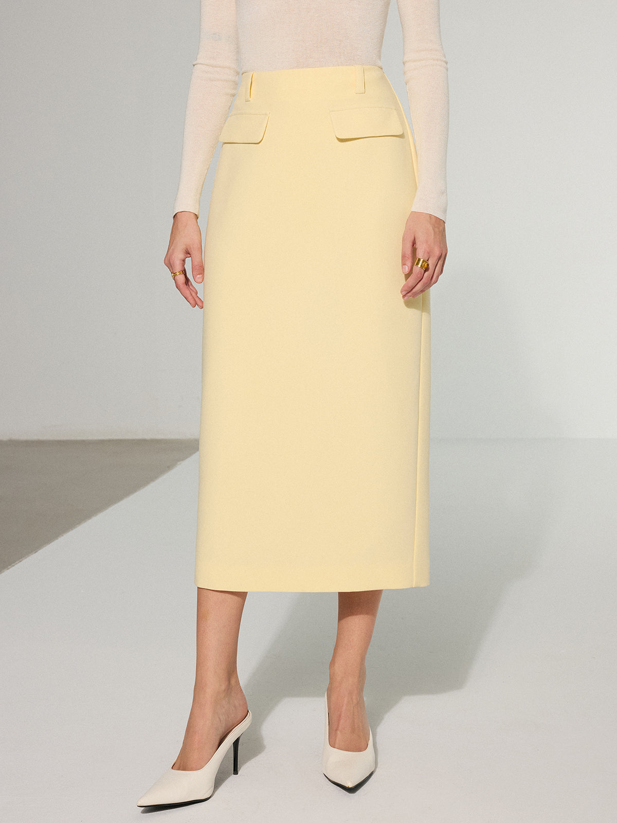 Midirock mit Ziertasche und Rückenschlitz 