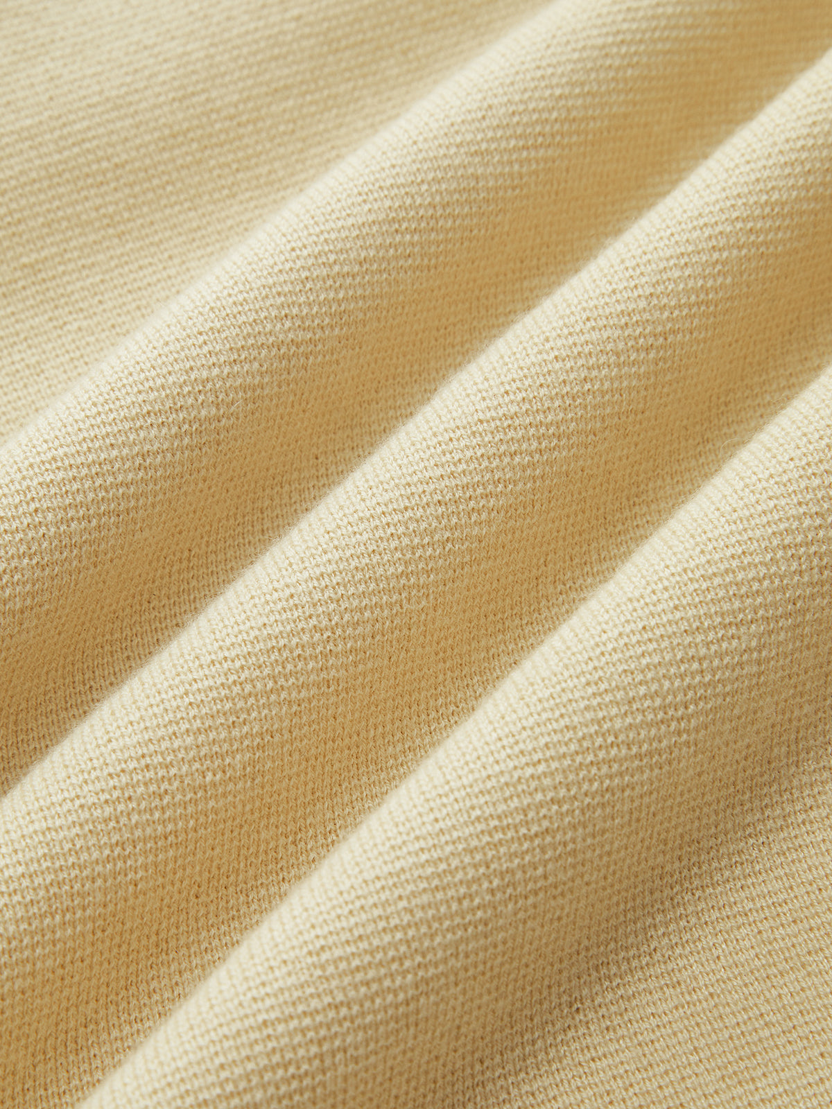 Robe longue à manches longues, en laine mélangée, avec perles et encolure découpée