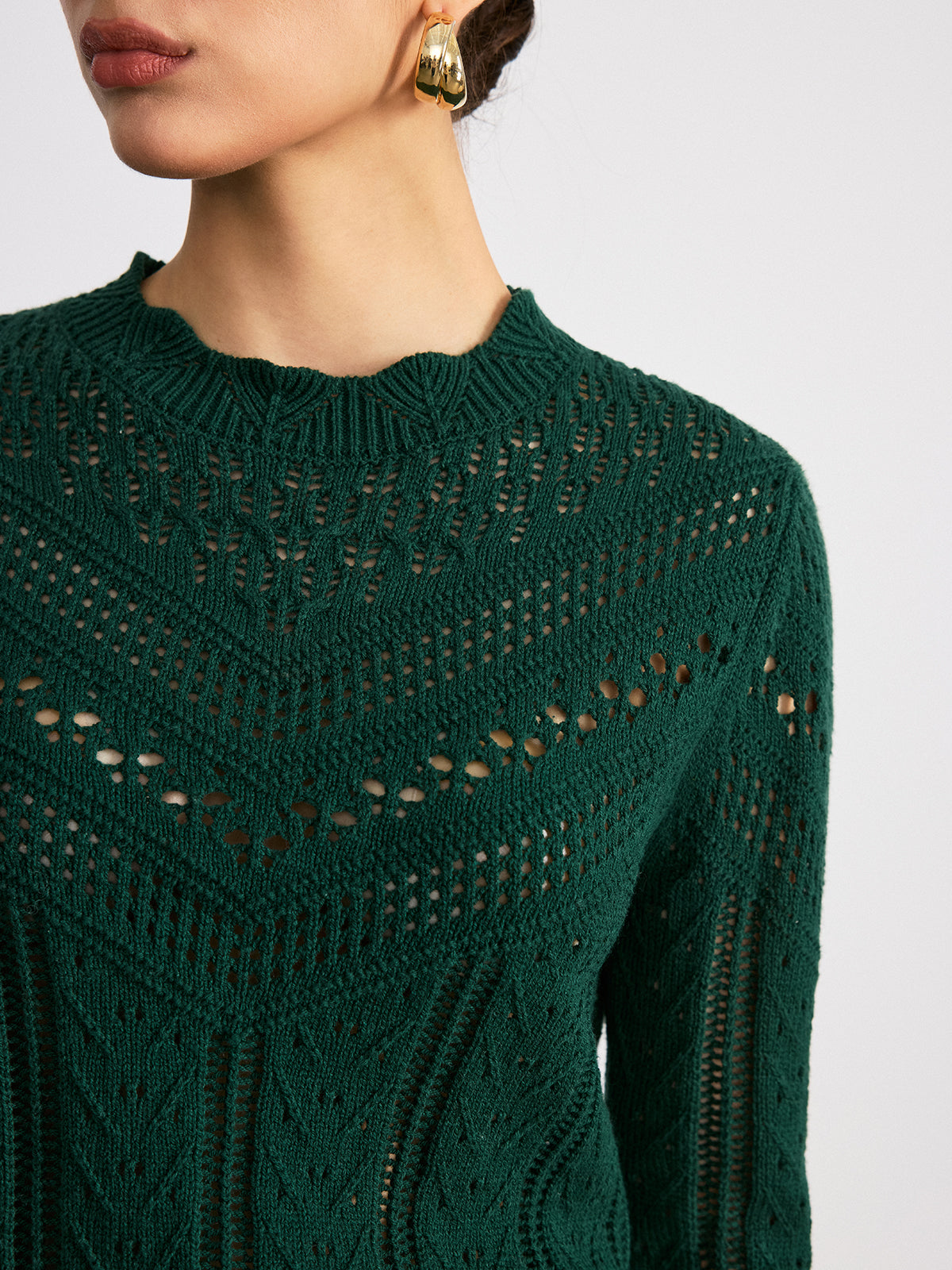 Strickpullover mit Wellenkante und Ajourmuster