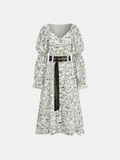 Robe longue en dentelle à manches bouffantes avec double ceinture