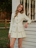 Mini-jupe plissée en tweed