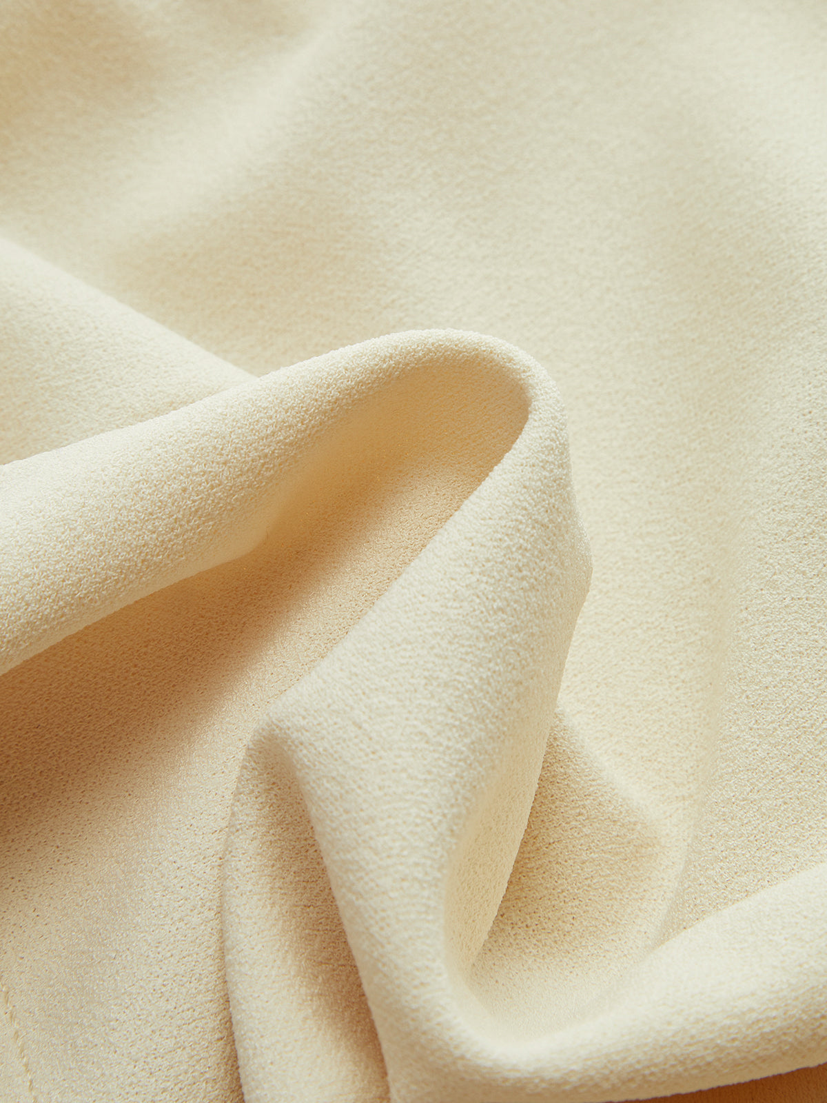 Crop top à bretelles tressées et col drapé