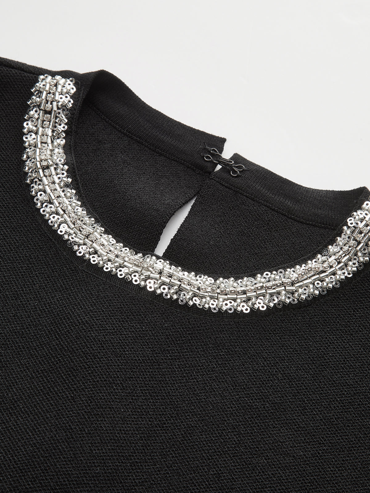 Sleeveless Flared Dress with Sequin Embellishments