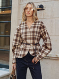 Manteau en tweed à carreaux ceinturé